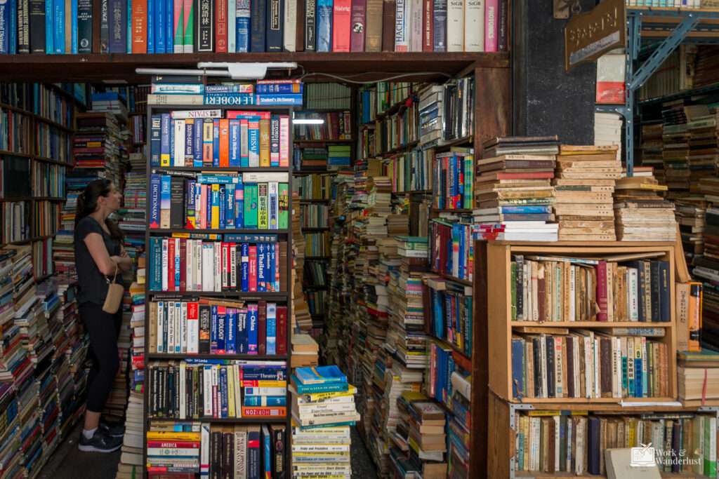 An outdoor book stall with shelves full of books