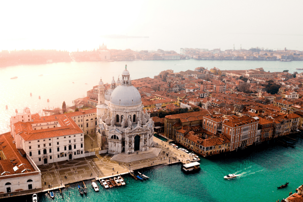 aerial view of Venice with a church and surrounding water